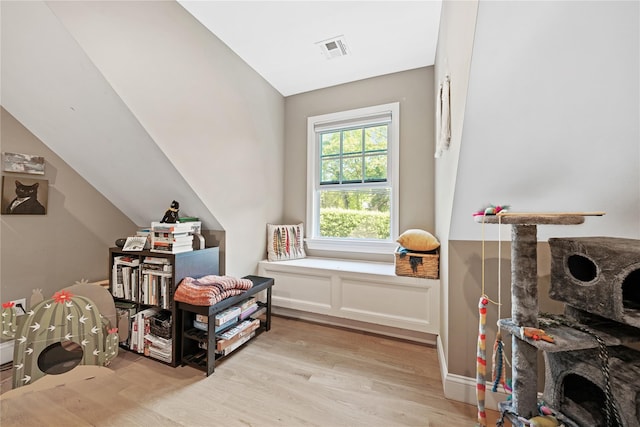 recreation room featuring light wood-style flooring