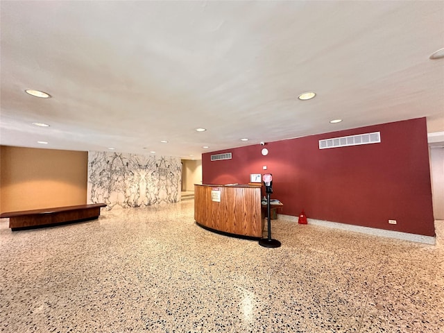 reception featuring indoor bar and visible vents