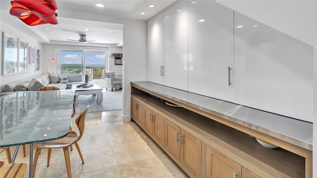 575 Dune Rd Unit 36And 37, Westhampton Beach, NY 11978 - kitchen featuring recessed lighting, a ceiling fan, light tile patterned floors, stone countertops, and open floor plan