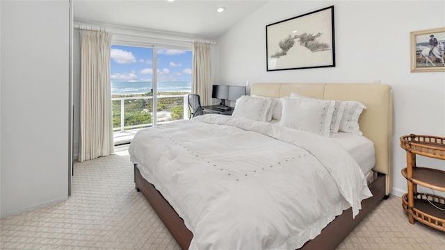 575 Dune Rd Unit 36And 37, Westhampton Beach, NY 11978 - carpeted bedroom with access to exterior, multiple windows, baseboards, and recessed lighting