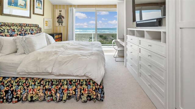 575 Dune Rd Unit 36And 37, Westhampton Beach, NY 11978 - bedroom featuring carpet floors, access to exterior, and a water view