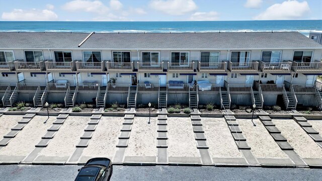 575 Dune Rd Unit 36And 37, Westhampton Beach, NY 11978 - view of building exterior with a water view