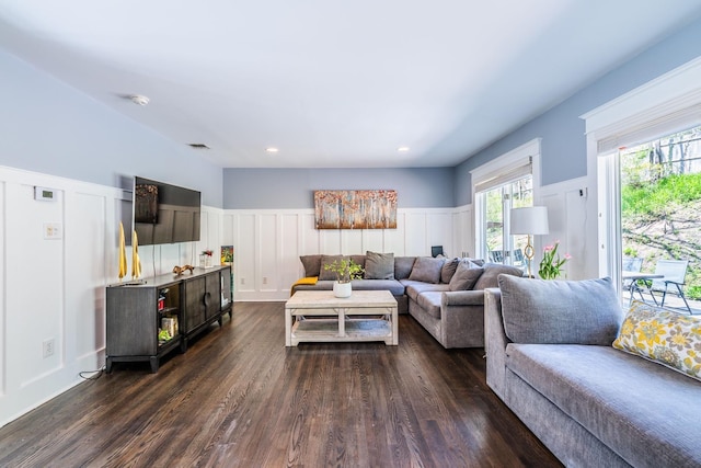 60 Bayview Dr, Huntington, NY 11743 - living room featuring a wainscoted wall, a decorative wall, and dark wood-style floors