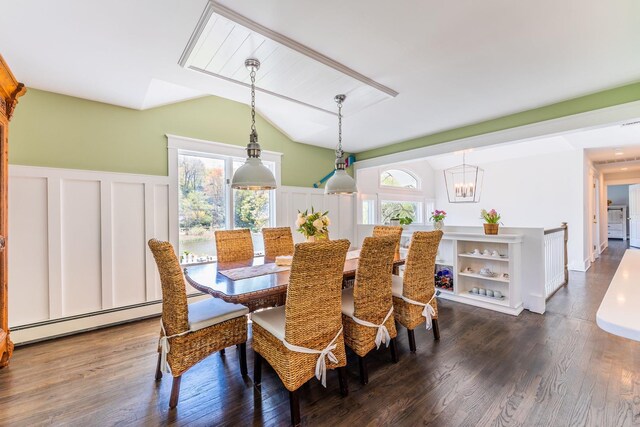 60 Bayview Dr, Huntington, NY 11743 - dining space with lofted ceiling, a wealth of natural light, dark wood-style floors, and a baseboard heating unit