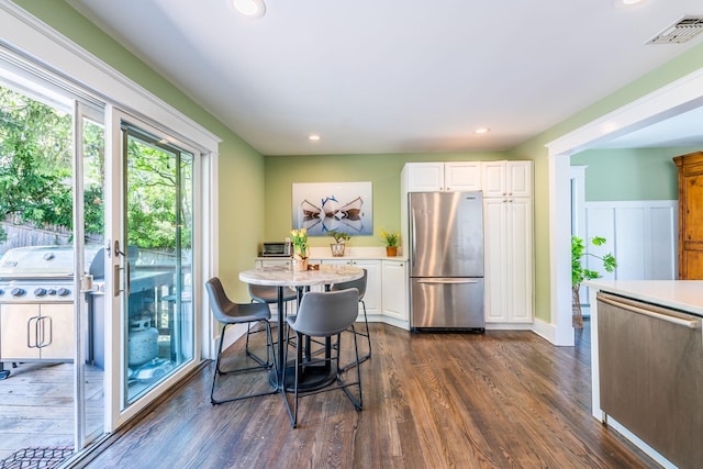60 Bayview Dr, Huntington, NY 11743 - dining area featuring dark wood-type flooring, visible vents, and recessed lighting