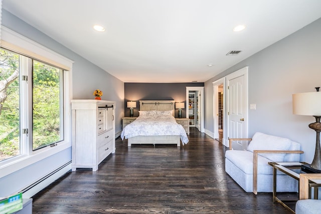 60 Bayview Dr, Huntington, NY 11743 - bedroom featuring recessed lighting, baseboard heating, visible vents, and dark wood-style floors
