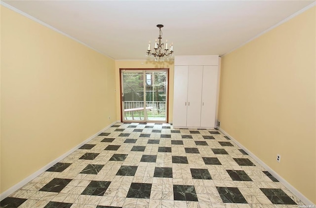 unfurnished dining area with crown molding, baseboards, and a chandelier