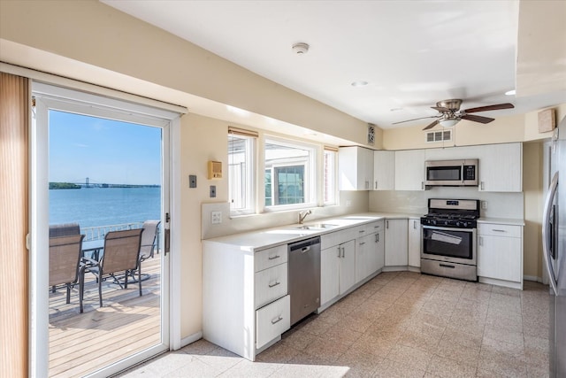 22 Shorecliff Pl, Great Neck, NY 11023 - kitchen featuring light countertops, a ceiling fan, visible vents, and appliances with stainless steel finishes