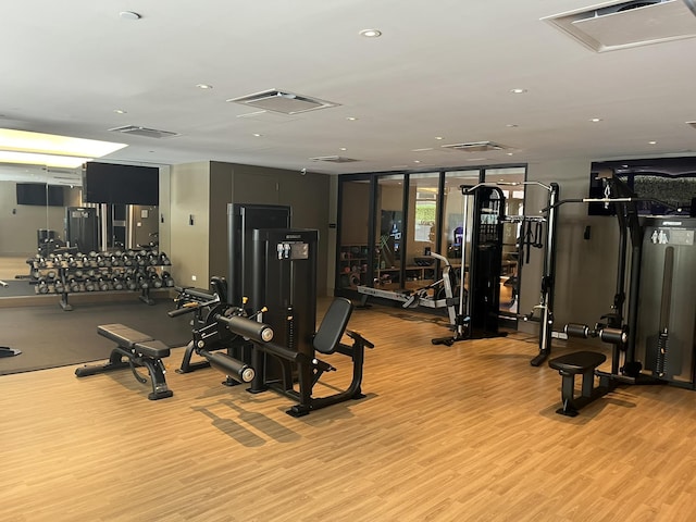 40 Broad St Unit 28H, New York Manhattan, NY 10004 - gym featuring light wood finished floors and recessed lighting