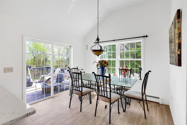 14 Clarks Ln, Milton, NY 12547 - dining room featuring healthy amount of natural light, light wood finished floors, baseboard heating, and high vaulted ceiling