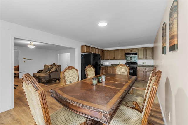 14 Clarks Ln, Milton, NY 12547 - dining area featuring light wood-type flooring and baseboards
