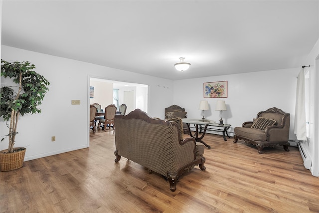 14 Clarks Ln, Milton, NY 12547 - living area with light wood-style flooring, baseboards, and baseboard heating