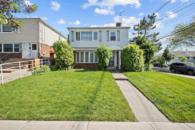 9702 159th Ave, Howard Beach, NY 11414 - traditional-style home with brick siding and a chimney