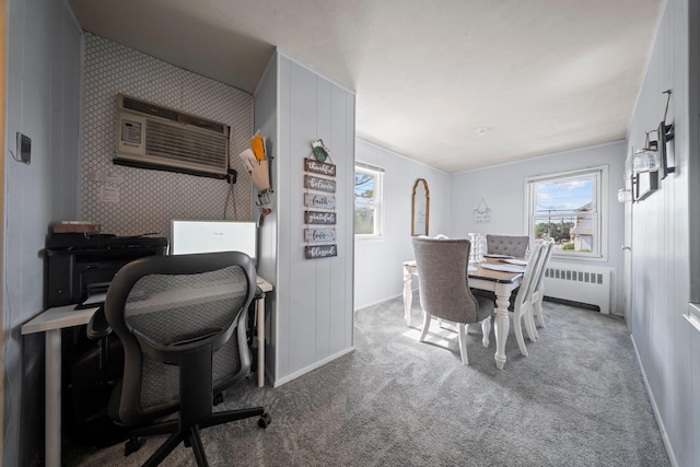 9702 159th Ave, Howard Beach, NY 11414 - home office with radiator heating unit, a wall mounted air conditioner, carpet flooring, and baseboards
