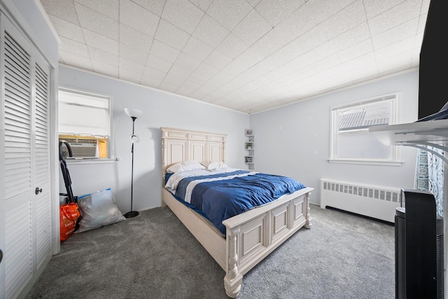 9702 159th Ave, Howard Beach, NY 11414 - carpeted bedroom featuring radiator heating unit and cooling unit