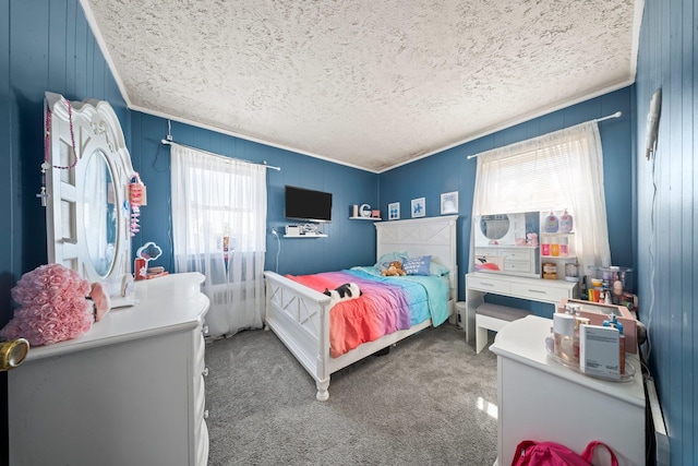 9702 159th Ave, Howard Beach, NY 11414 - carpeted bedroom featuring a textured ceiling, ornamental molding, and wooden walls