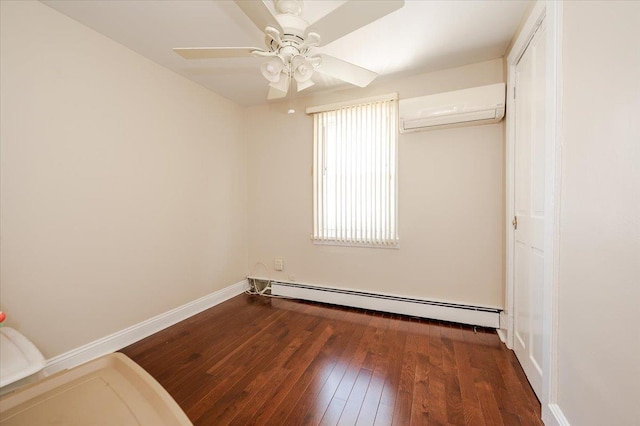 unfurnished bedroom with a wall mounted air conditioner, a baseboard heating unit, baseboards, ceiling fan, and hardwood / wood-style floors