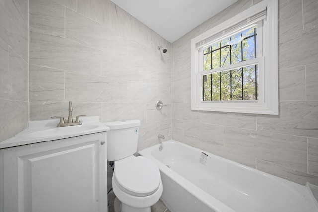 119-47 191st St, Saint Albans, NY 11412 - bathroom with toilet, tile walls, vanity, and shower / tub combination
