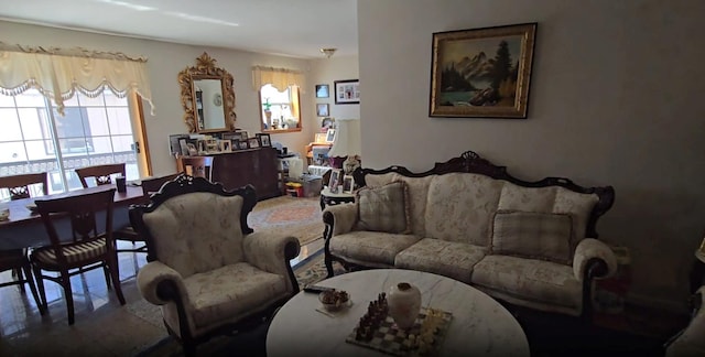 living area featuring a healthy amount of sunlight