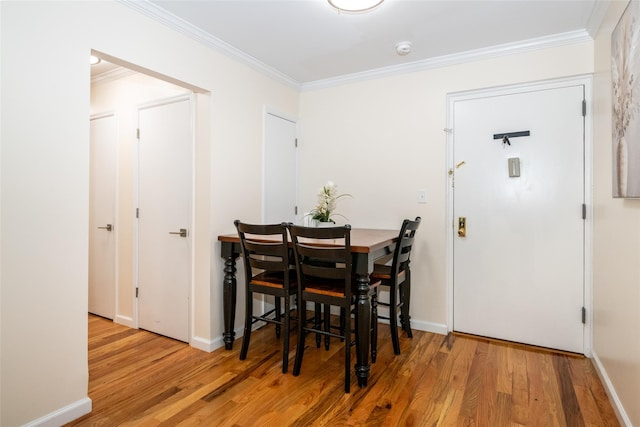 90 Union St Unit 1A, New Rochelle, NY 10801 - dining room with crown molding, wood finished floors, and baseboards