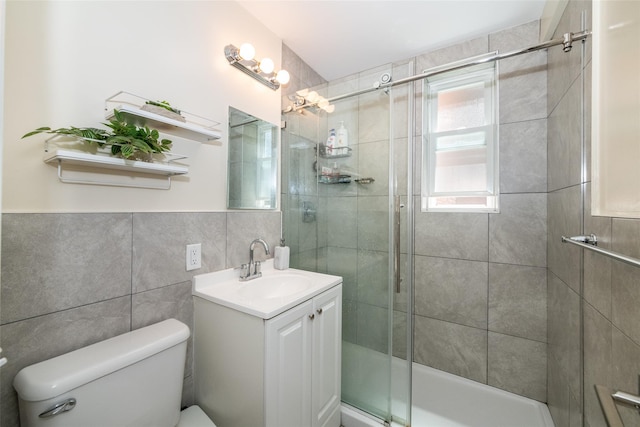 90 Union St Unit 1A, New Rochelle, NY 10801 - bathroom with toilet, tile walls, a shower stall, and vanity