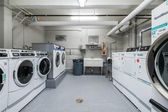 90 Union St Unit 1A, New Rochelle, NY 10801 - community laundry with independent washer and dryer and concrete block wall