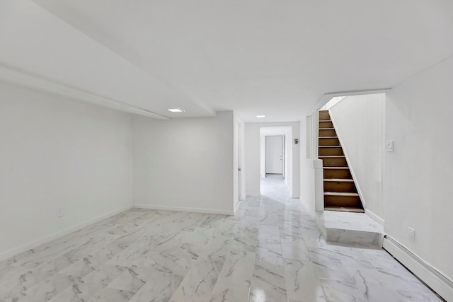 interior space featuring stairs, baseboards, marble finish floor, and a baseboard heating unit