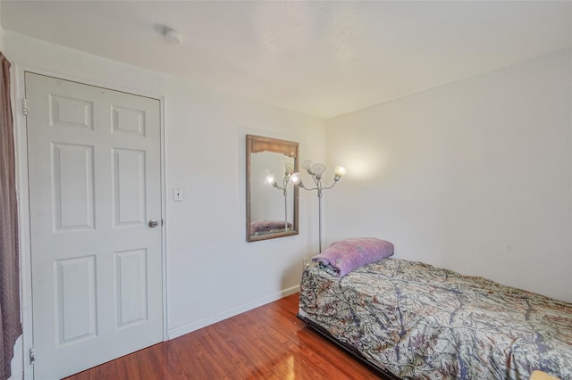 1564 Illinois Ave, Bay Shore, NY 11706 - bedroom with wood finished floors and baseboards