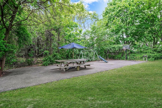 1564 Illinois Ave, Bay Shore, NY 11706 - view of green lawn with a playground