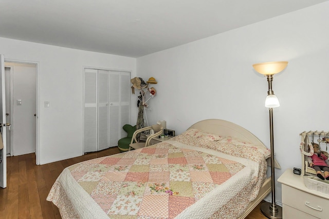 138-10 Franklin Ave Unit 9J, Flushing, NY 11355 - bedroom featuring dark wood-type flooring and a closet