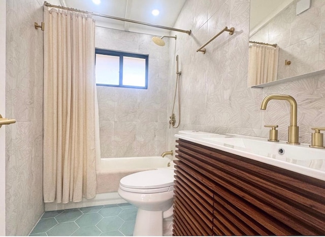 full bathroom with tile patterned floors, shower / bath combo, toilet, and vanity