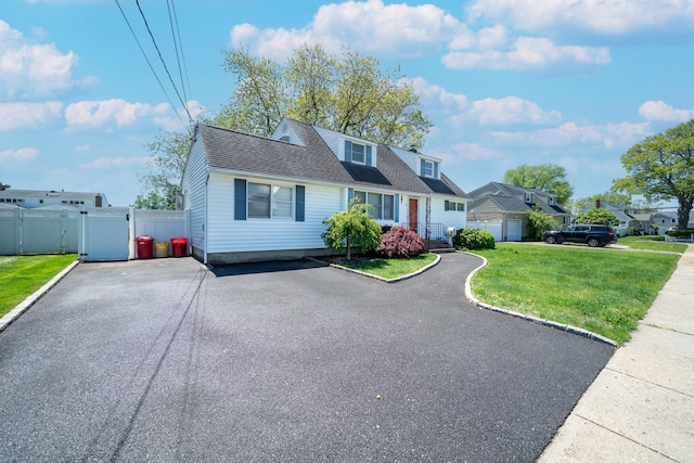 6 Pompano Ln, Massapequa Park, NY 11762 - view of front of property featuring a gate and roof with shingles