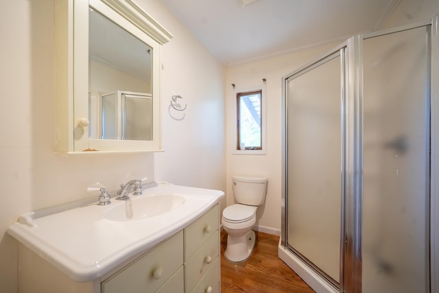6 Pompano Ln, Massapequa Park, NY 11762 - bathroom with a shower stall, wood finished floors, toilet, vanity, and baseboards