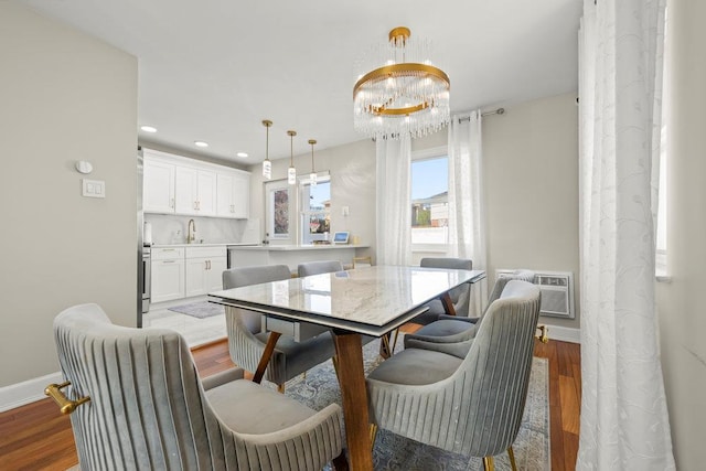 80-21 209th St, Hollis Hills, NY 11427 - dining area with a chandelier, baseboards, light wood-style flooring, and recessed lighting