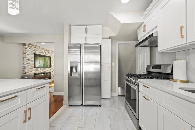 80-21 209th St, Hollis Hills, NY 11427 - kitchen with open floor plan, white cabinets, baseboards, under cabinet range hood, and appliances with stainless steel finishes