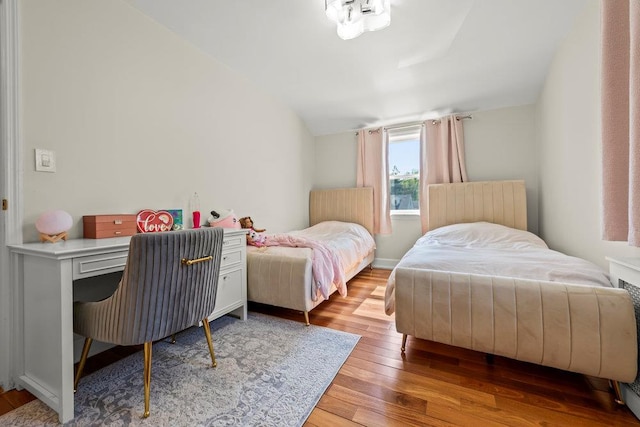 80-21 209th St, Hollis Hills, NY 11427 - bedroom featuring vaulted ceiling and wood-type flooring