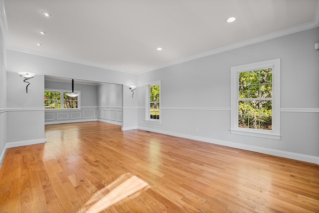 37 Shallow Stream Rd, Carmel, NY 10512 - unfurnished living room with healthy amount of natural light, light wood-style flooring, ornamental molding, recessed lighting, and baseboards