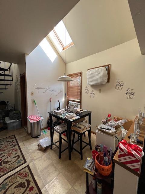 317 Elwood Ave, Hawthorne, NY 10532 - dining room featuring stairway and lofted ceiling with skylight