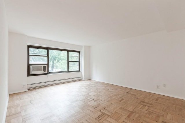 21-55 34th Ave Unit 3C, Long Island City, NY 11106 - unfurnished room featuring a baseboard heating unit, baseboards, and cooling unit