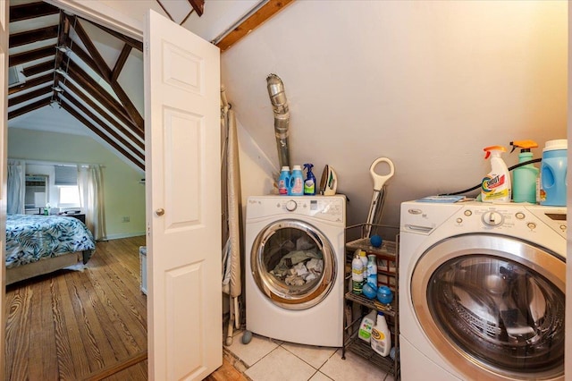 clothes washing area with laundry area and separate washer and dryer