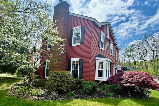 23 Candlestick Ct, Warwick, NY 10990 - view of side of home with a chimney