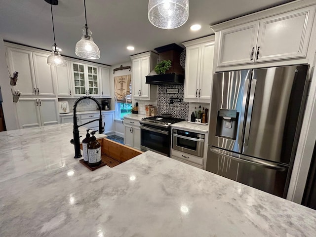 23 Candlestick Ct, Warwick, NY 10990 - kitchen featuring stainless steel appliances, custom exhaust hood, decorative backsplash, glass insert cabinets, and hanging light fixtures
