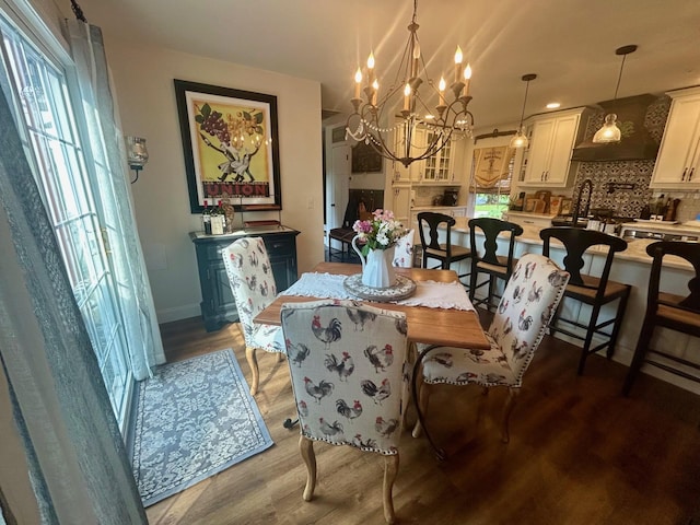 23 Candlestick Ct, Warwick, NY 10990 - dining room with wood finished floors, a chandelier, and baseboards