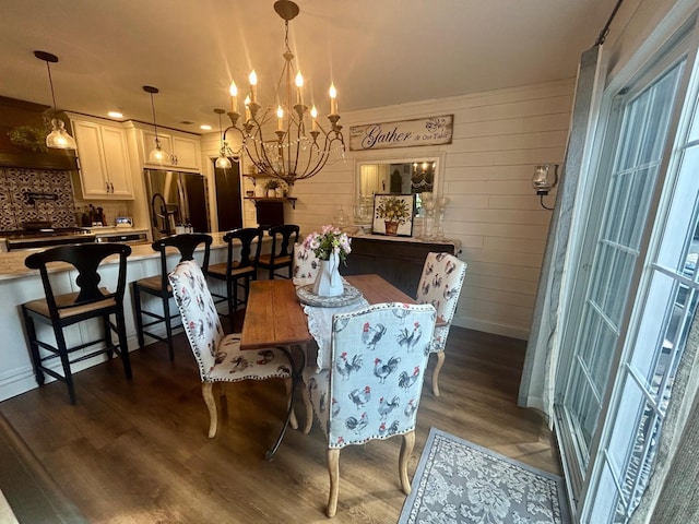 23 Candlestick Ct, Warwick, NY 10990 - dining area with dark wood-style floors, a chandelier, and baseboards