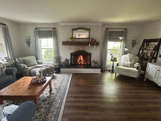 23 Candlestick Ct, Warwick, NY 10990 - living area featuring healthy amount of natural light, a brick fireplace, and dark wood-style floors