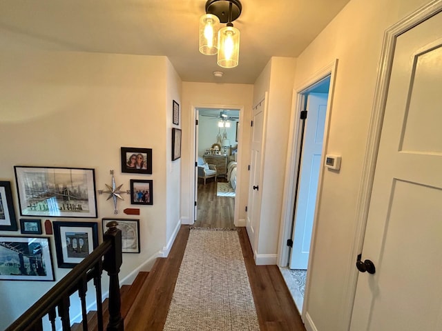 23 Candlestick Ct, Warwick, NY 10990 - hallway with dark wood-style floors, an upstairs landing, and baseboards
