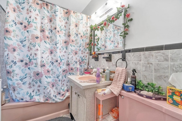 bathroom featuring vanity and shower / tub combo