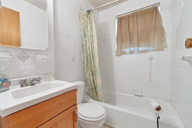 bathroom with tile walls, toilet, shower / bath combination with curtain, vanity, and decorative backsplash