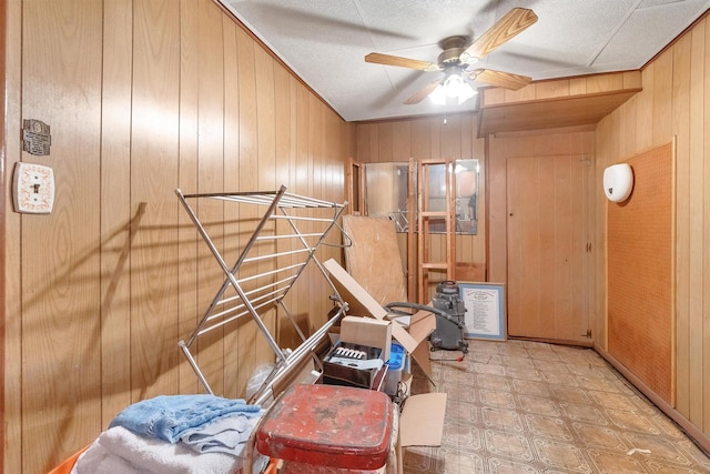 interior space with a ceiling fan