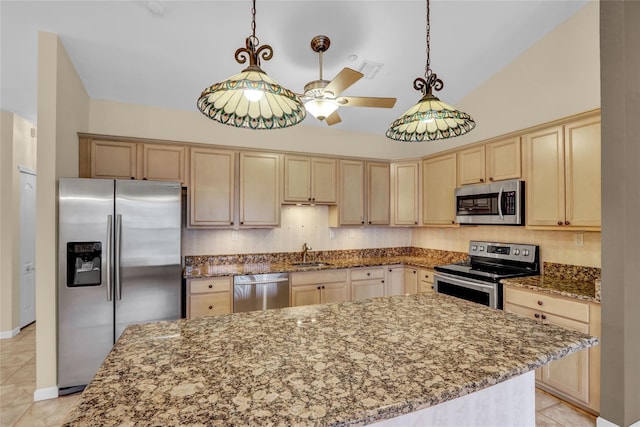 606 Narragansett Villas Dr Unit 606, Lindenhurst, NY 11757 - kitchen featuring appliances with stainless steel finishes, a sink, light brown cabinets, light stone counters, and lofted ceiling